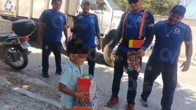 Photo of Recolectores de basura celebran cumpleaños de niño que los admira