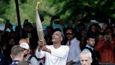 Photo of Snoop Dogg porta la llama olímpica